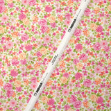 Piqué de coton imprimé les fleurs de Sarah rose et orange fond blanc