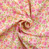 Piqué de coton imprimé les fleurs de Sarah rose et orange fond blanc