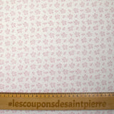 Piqué de coton imprimé brindille dans le vent vieux rose fond blanc