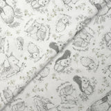 Piqué de coton imprimé les animaux de la forêt vert fond blanc