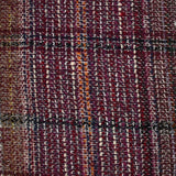 Capucine wool blend tweed, navy and black line, wine background