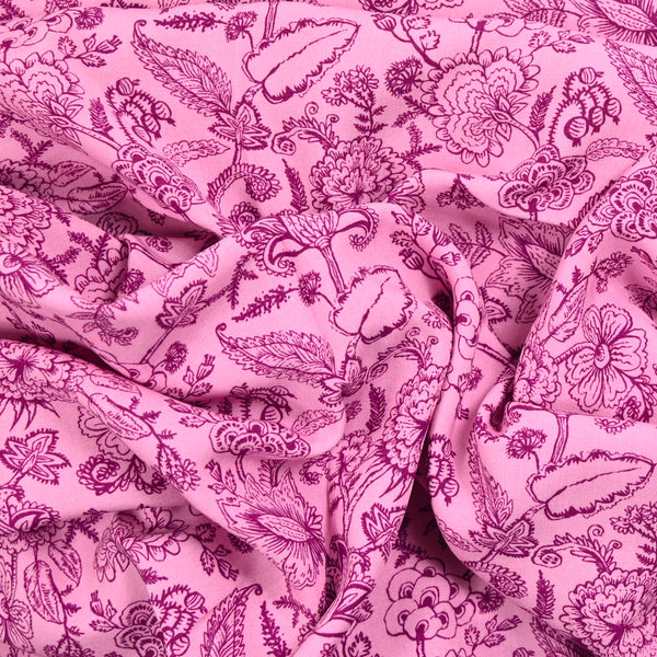 Viscose imprimée contour de fleurs fond rose