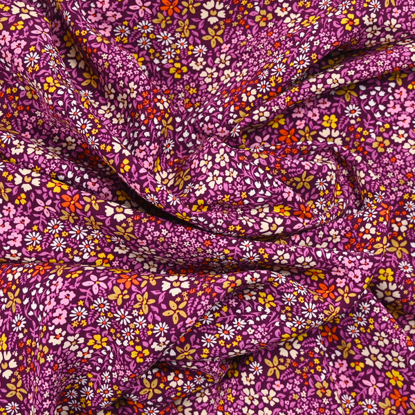 Viscose imprimée vague de fleurs fond violet