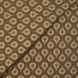 Coton imprimé goutte d'or fond marron
