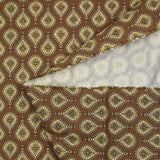 Coton imprimé goutte d'or fond marron
