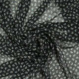 Mousseline imprimée fleurs et pois fond noir