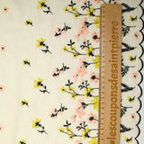 Mousseline de soie brodée festonnée écru au mètre