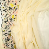 Mousseline de soie brodée festonnée écru au mètre