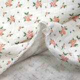 Jersey de coton matelassé imprimé fleurettes fond blanc