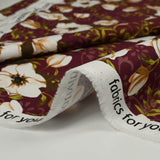 Coton imprimé fleurs d'Anna fond lie de vin