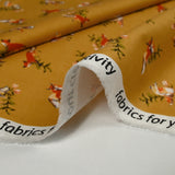 Cotton print fox ocher background