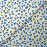 Crêpe viscose imprimé fleurs bleues fond écru
