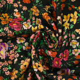 Crêpe viscose imprimé printemps en fleurs fond noir