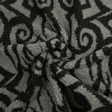 Lainage polyester sherpa tourbillon noir et gris