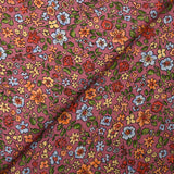 Crêpe viscose imprimé envolée florale fond cassis glacé