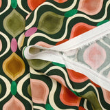 Viscose imprimée ondulations rétro fond vert foncé