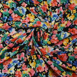 Microfibre imprimée polyester fleurs Nadège fond noir