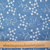 Blue background embroidered polyester twill