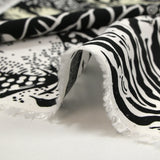 Viscose imprimée gravure tropicale fond noir