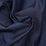 Fine cotton jeans with navy stripe background