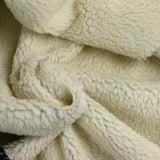 Simili cuir noir brillant envers sherpa fausse fourrure mouton écru