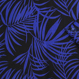 Viscose printed tropical leaves in royal blue with black background