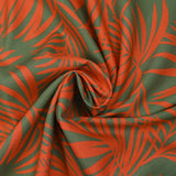 Viscose imprimée feuilles tropicales orange fond vert