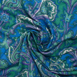 Water green and mauve cashmere printed viscose with blue background