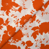 Viscose imprimée silhouettes de fleurs orange fond blanc