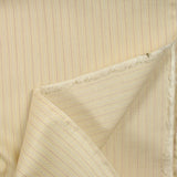 Coton tissé-teint rayé fuchsia fond sable