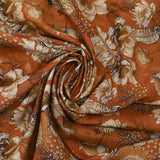 Viscose printed with chrysanthemums on a burnt orange background