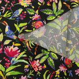 Viscose printed flowers and parrots on black background