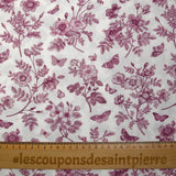 Viscose printed with purple flowers and butterflies on a white background
