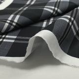 Coton imprimé à carreaux tartan bleu gris et noir