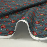 Coton imprimé fleurs rouges fond anthracite rayé