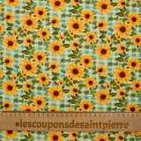 Coton imprimé tournesol fond vichy bleu