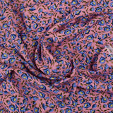 Viscose imprimée rêve botanique fond fraise glacé