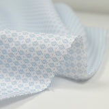 Coton imprimé minis pois ciel fond blanc