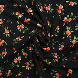 Maille Milano imprimée pluie de roses fond noir