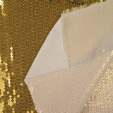 Golden sequins on Mousseline