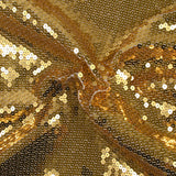 Golden sequins on Mousseline