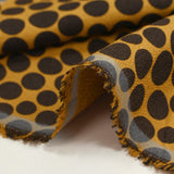 Crêpe viscose et soie imprimé pois fond ocre