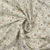 Popeline de coton imprimée esquisse florale marron fond écru