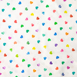 Piqué de coton imprimé arc en ciel de coeur