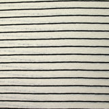 Jersey de coton flammé pointelle rayé noir et blanc cassé