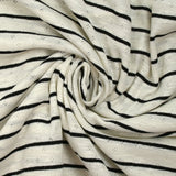 Jersey de coton flammé pointelle rayé noir et blanc cassé