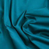 Popeline de coton satinée bleu pétrole