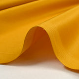 Popeline de coton satinée jaune soleil