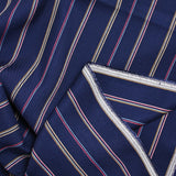 Woven viscose dyed red striped navy background