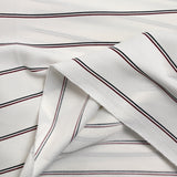 Crêpe de polyester imprimé rayures fond blanc cassé